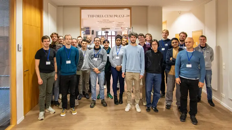 Group photo of IMPRS Combo IV participants in front of the Leibniz Hall