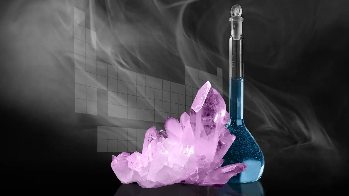 Exemplary depictions of all states of matter (a purple crystal, a blue liquid in a flask, and a gray gas) in front of a periodic table