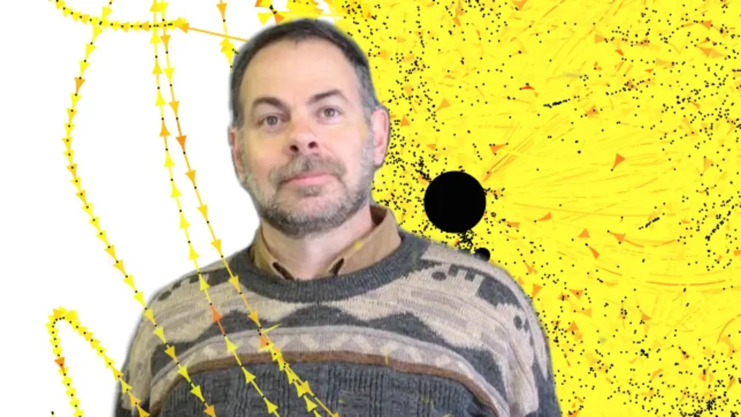 Portrait of Emil Saucan, in the background a curvature-colored network plot of a Google web graph