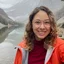 Portrait of Dani Kaufman in front of mountains